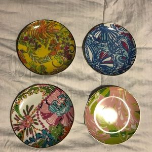 Set of 4 Lily Pulitzer plates.